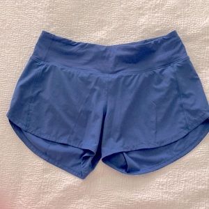 Lululemon Size 6 speed up mid rise shorts. 4 inch inseam, wild indigo color
